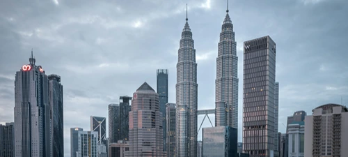 Kuala Lumpur skyline, representing MSL's Malaysia market presence.